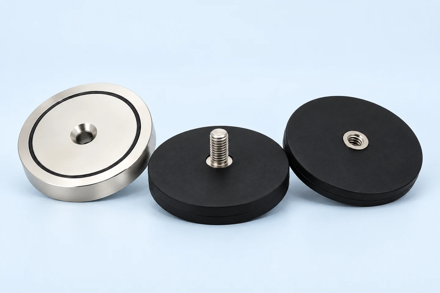 Magnetic holding assemblies with countersunk and threaded interfaces